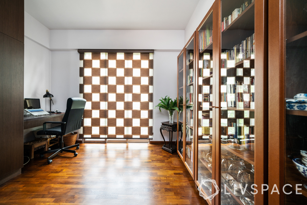 home office-wooden flooring-glass cabinet-storage